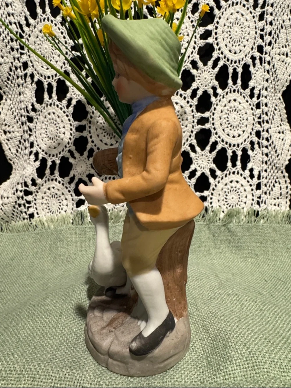 Boy Figurine with A Duck or Goose - White and Pastel Colors
